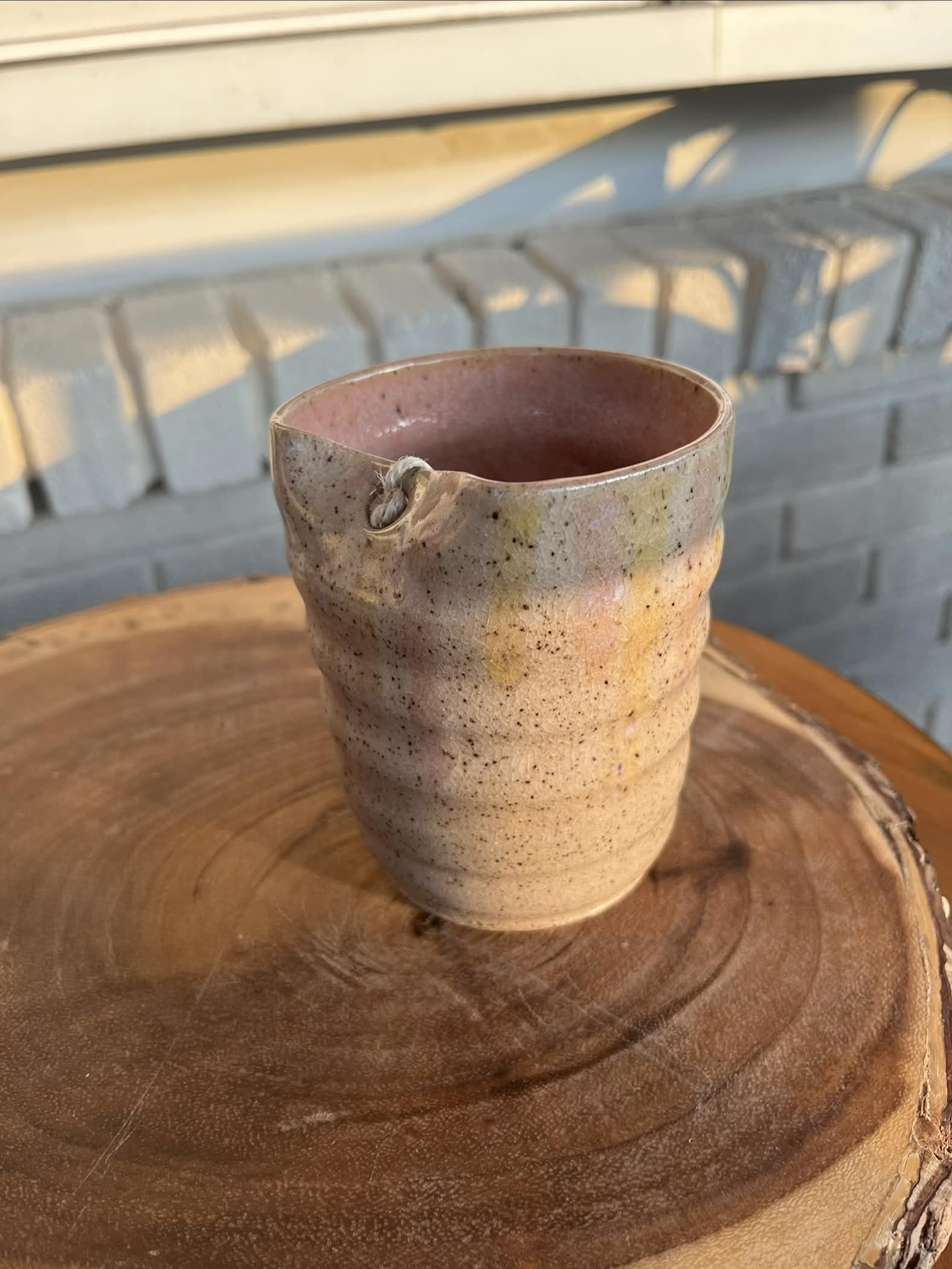 Speckled ceramic tumbler with straw hole