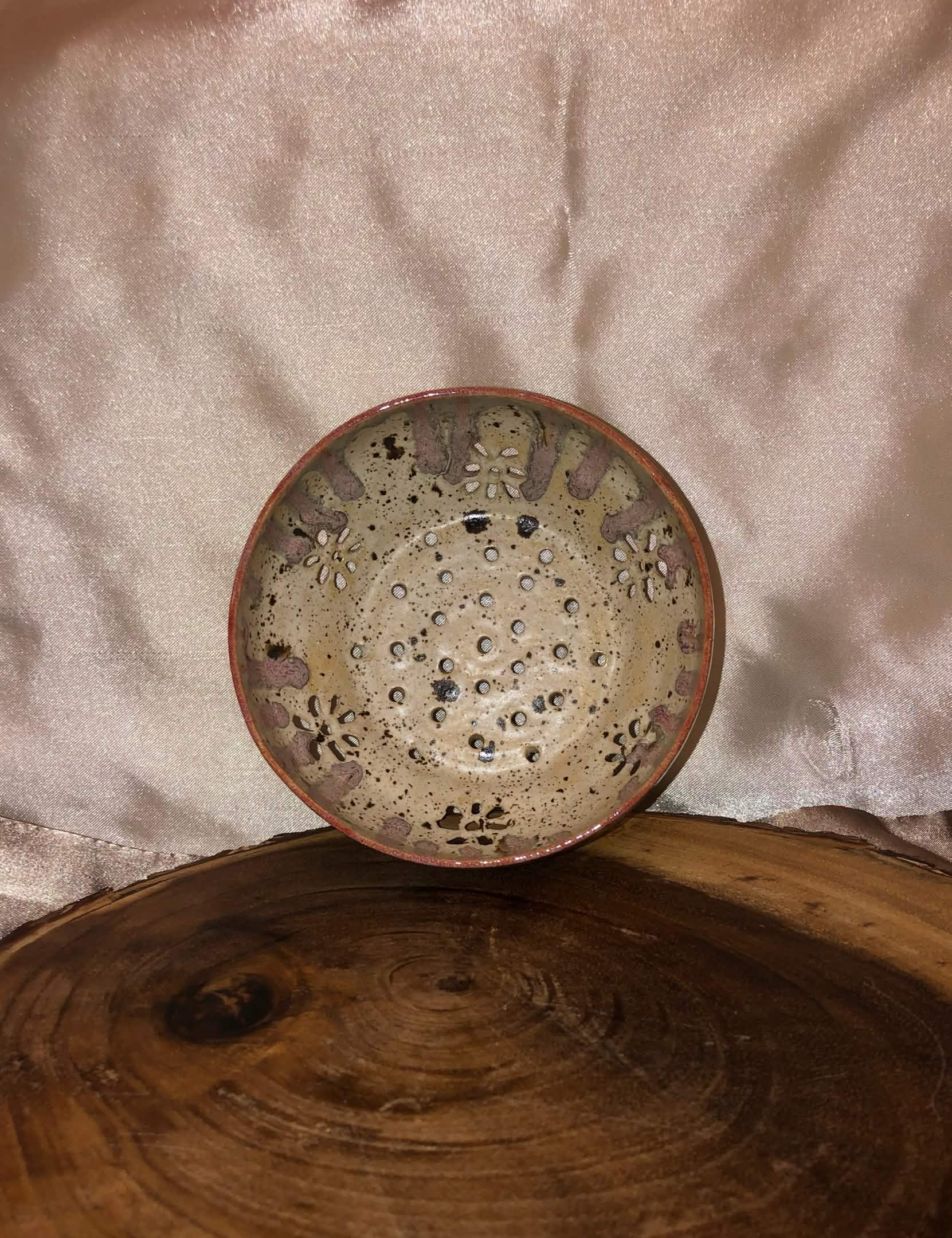 Small planter bowl with flower cutouts
