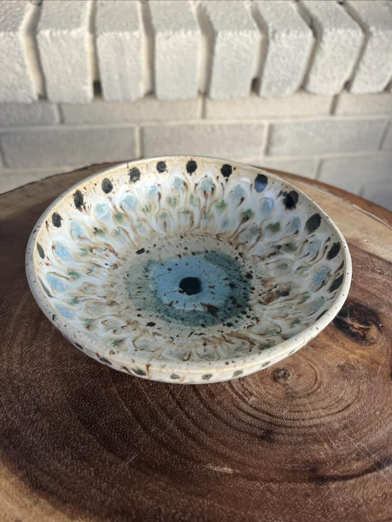 Cream white and blue dish with peacock design